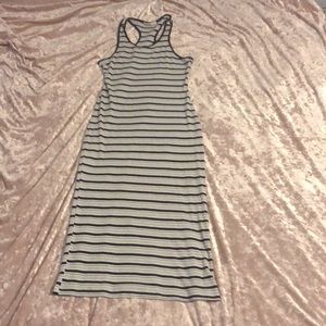 I am selling a long dress. It’s a tank dress. It’s black and white.